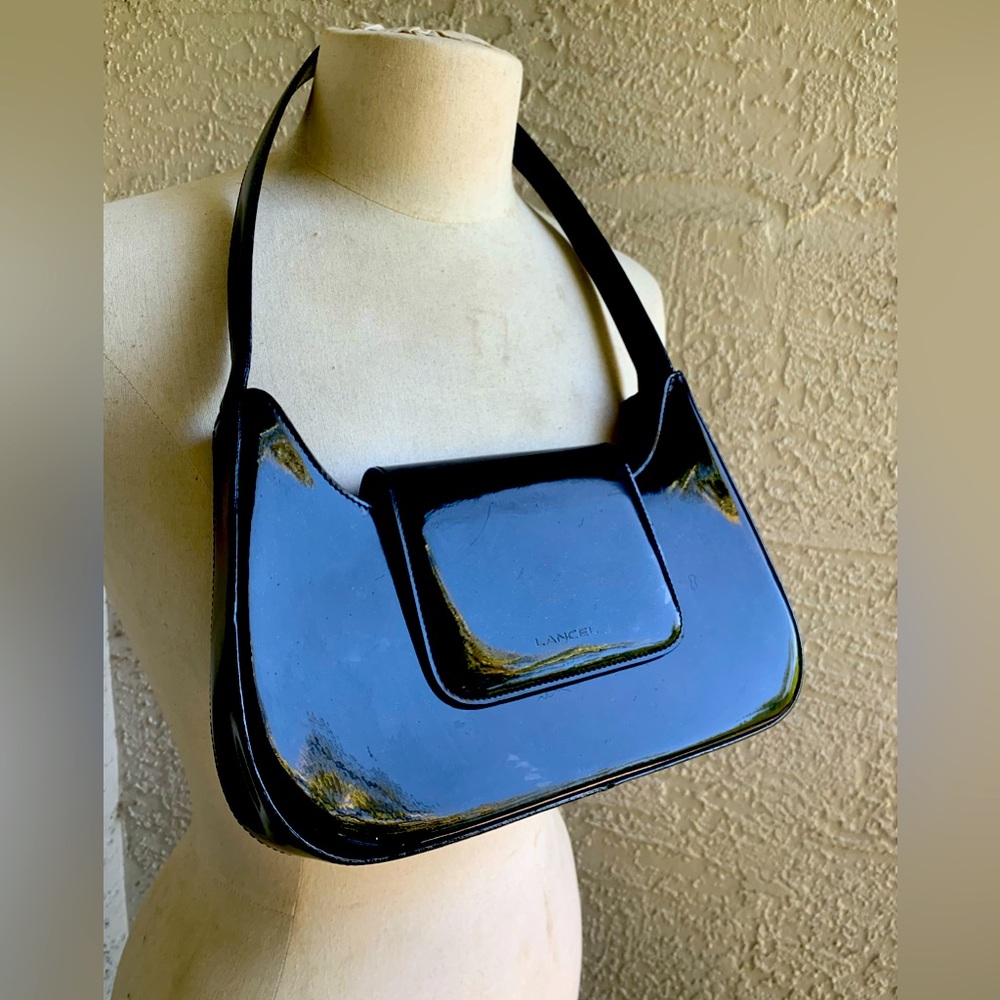 Lancel Paris Rare Vintage Black handbag with metal clasp closure